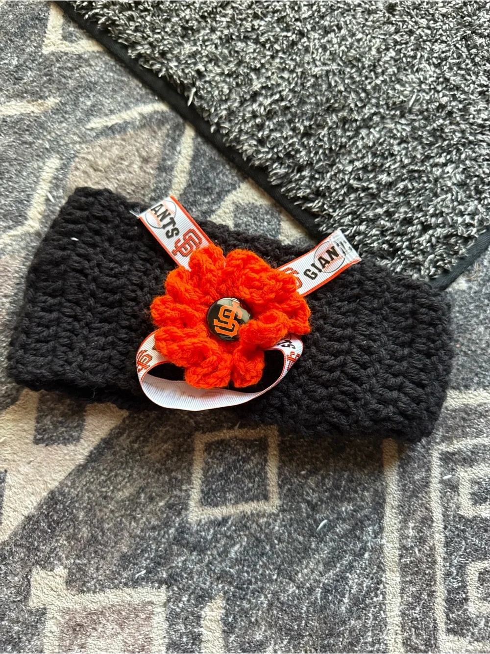 Crochet Headband with Orange Flower